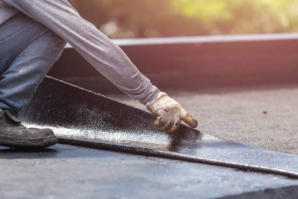 Professional Basement Waterproofing technician working in Riverside, IL